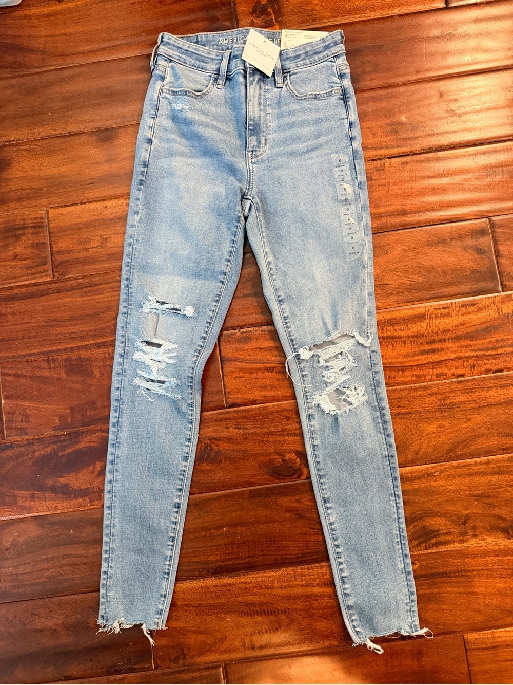 NWT American Eagle Outfitters Light Blue Distressed Super HR Jegging